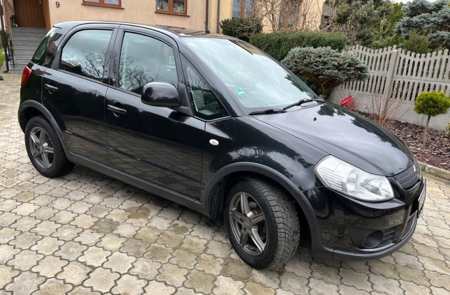 Suzuki SX4 cena 19900 przebieg: 143000, rok produkcji 2008 z Wisła małe 497